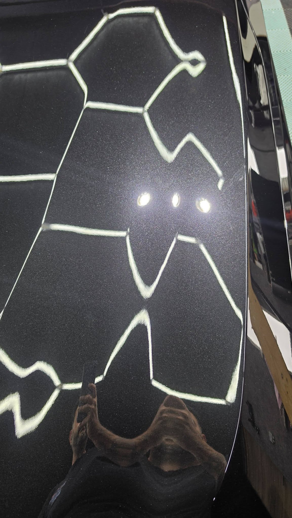 Carrosserie noire de la BMW Série 2 après polissage et protection